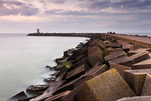 Concrete Blocks Form The Jetty Of The Harbor Of Scheveningen In The Netherlands