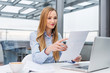 © baranq - Happy business woman reading report
