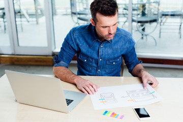 ambitious web designer designing a responsive website