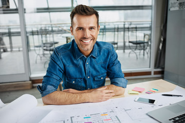 Wall Mural - Happy architect working at office