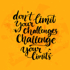 Don't limit your challenges, challenge your limits. Inspirational quote at yellow background with messy ink texture, brush typography for poster, t-shirt or card. Vector calligraphy
