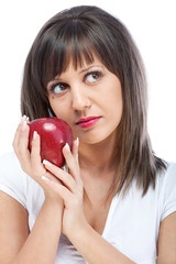 Wall Mural - Young woman eating red apple