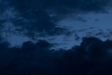 Wall Mural - black cloud in dark night sky background