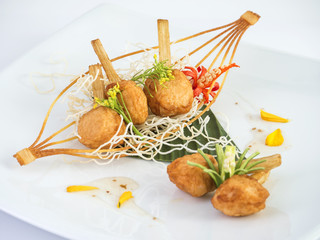 Vietnamese food 2 - Fried shrimp with sugar cane (Vietnamese food) on white dish with isolated background