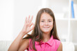© Mediteraneo - Beautiful smiling deaf girl using sign language