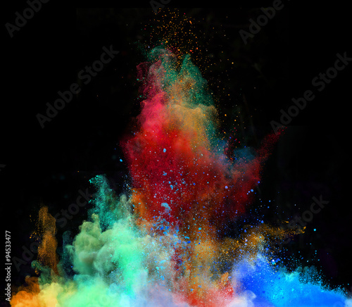 Launched colorful powder on black background