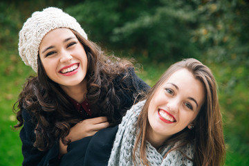 Cute best friend girls a piggyback