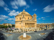 Long exposure shot about the famous Mosta Dome with moving clouds at daylight - Malta