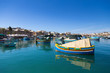Typical colorful fishing boats near Marsaxlokk market, Malta