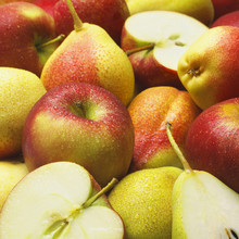 Sliced And Whole Apples And Pears In Close Up.