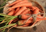 Fototapeta Tulipany - fresh carrot wood background