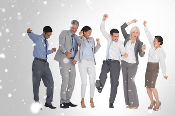 Wall Mural - Composite image of business people cheering in office