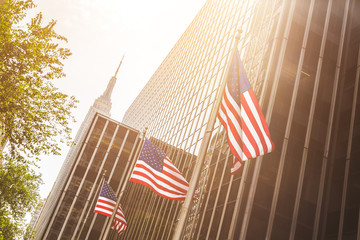 Wall Mural - United States flags waving  in New York