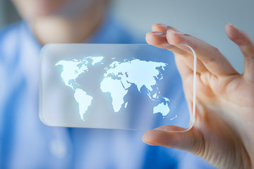 Wall Mural - close up of woman with transparent smartphone