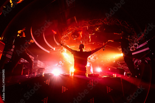 Fotografie, Obraz DJ hands up in night club party background