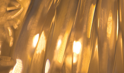 Wall Mural - lights reflection on golden metallic background