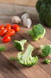 © inews77 - Fresh broccoli slice on the wooden cutting board.