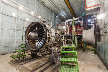 Engine turbo fan in aviation hangar