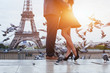 canvas print picture - couple near Eiffel tower in Paris, romantic kiss