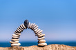 White arch of pebbles