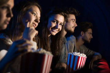 Wall Mural - Group of friends in the movie theater