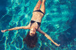 Woman Floating in Water Relaxing