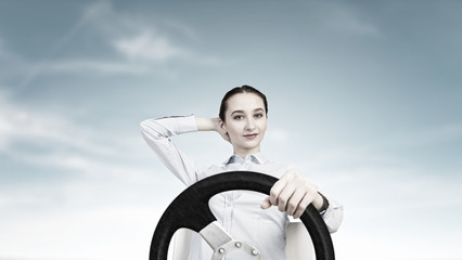 Wall Mural - Woman with steering wheel