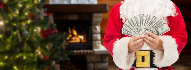 Canvas Print - close up of santa claus with dollar money