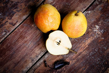 Ripe Pears On The Wooden Table
