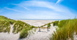 Beautiful tranquil dune landscape at long North Sea beach 