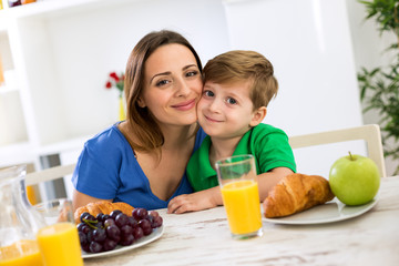 Happy smiling family in the morning