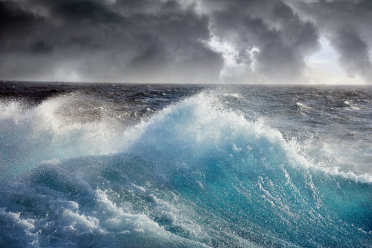 Fototapete - sea wave on the dark cloudes  background