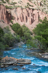 Mountain river at rocky landscape in the Fan Mountains. Pamir. T