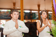 Just Married In A Buddhist Temple. Selective Focus