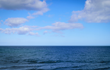 sea and blue sky with cloud background