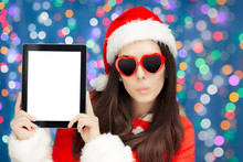 Surprised Christmas Girl With Heart Sunglasses And Tablet
