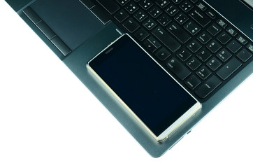 laptop and smartphone on white background