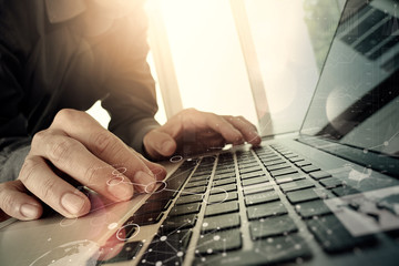 close up of business man hand working on blank screen laptop com
