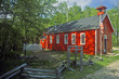 Red schoolhouse in rustic setting, MI