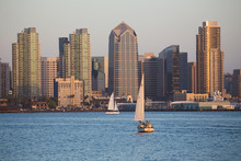 Scenic San Diego Skyline, Sailboat And Waterfront, Pacific Ocean At Sunset, California.