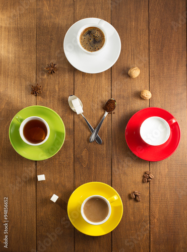 Fototapeta na wymiar cup of tea, milk, coffee on wood