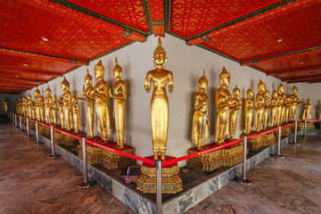 Golden buddha statues in Wat Pho, Bangkok. Thailand.