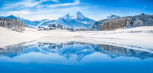 Winter Wonderland In The Alps Reflecting In Crystal Clear Mountain Lake