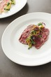 © neillangan - beef carpaccio plated appetizer starter