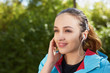 © Myvisuals - Portrait of a runner listening to music on headphones while runn