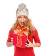 © Dmitry Lobanov - Happy young woman hold red Christmas wrapped gift present smilin