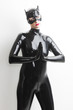 © Richard Semik - portrait of standing woman wearing latex clothes