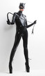 © Richard Semik - standing woman wearing latex clothes with a whip