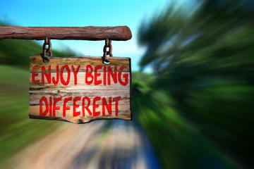 Wall Mural - Enjoy being different motivational phrase sign