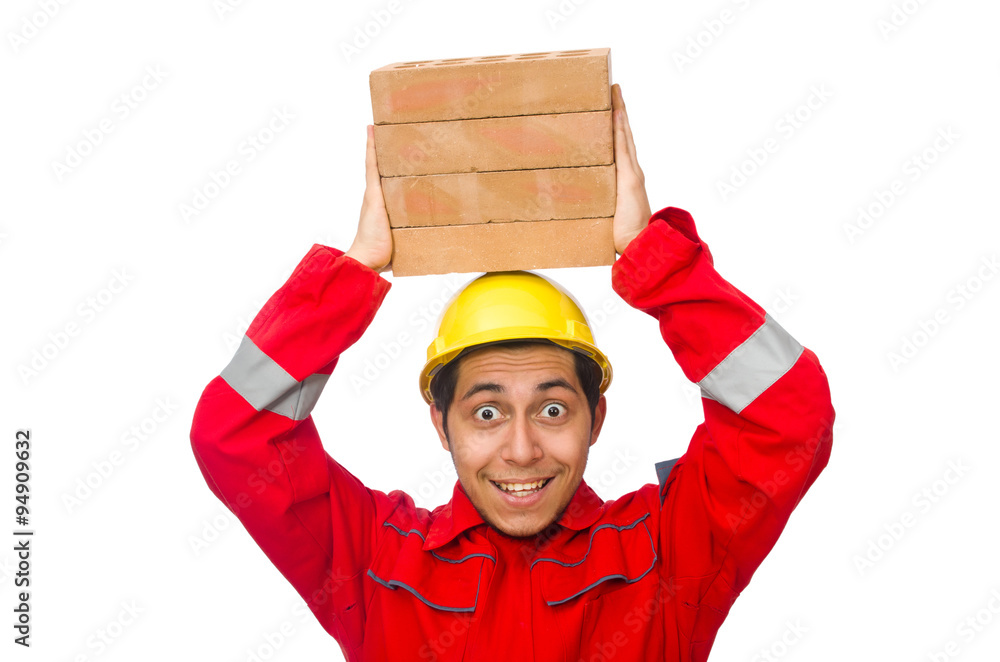 Construction worker with clay bricks on white